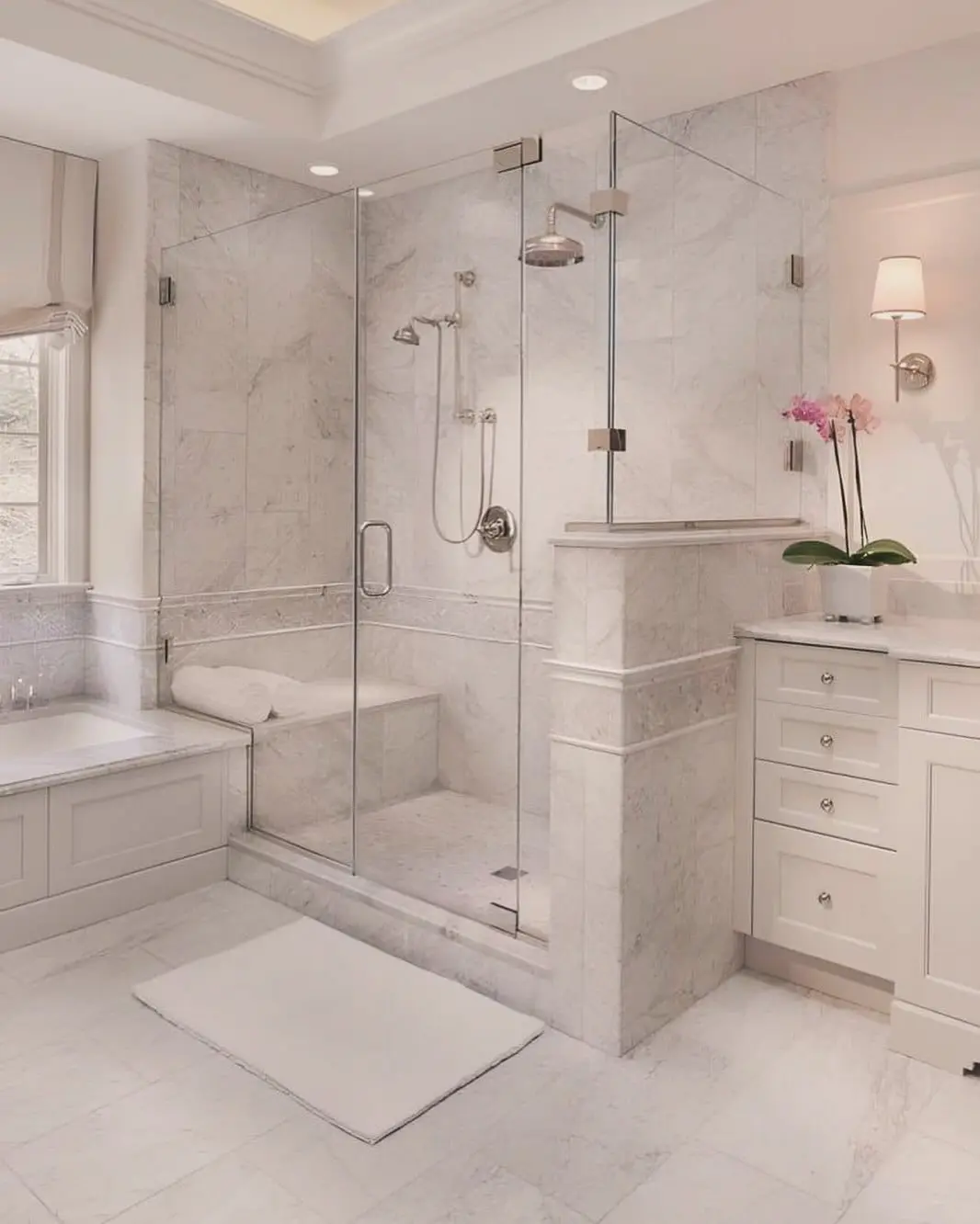 Spa-grade primary bathroom with all-marble steam enclosure, built-in bench, recessed soaking tub alcove, and coffered plaster ceiling in Rye, Westchester County — JMR Construction
